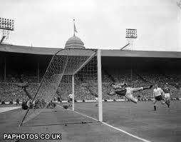 Tottenham scores against Leicester in the 1961 FA Cup final